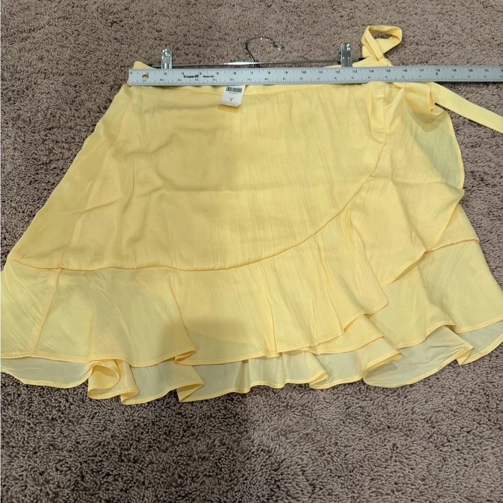 NWT new medium Anthropologie Maeve ruffle mini skirt yellow wrap tie